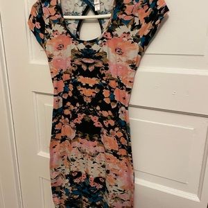 Xhilaration Floral Bodycon Dress. This dress is very flattering & comfortable.